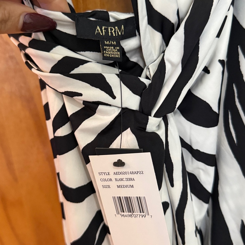 AFRM Black and White Zebra Halter Midi Dress
Feel free to make an offer - Picture 3 of 3
